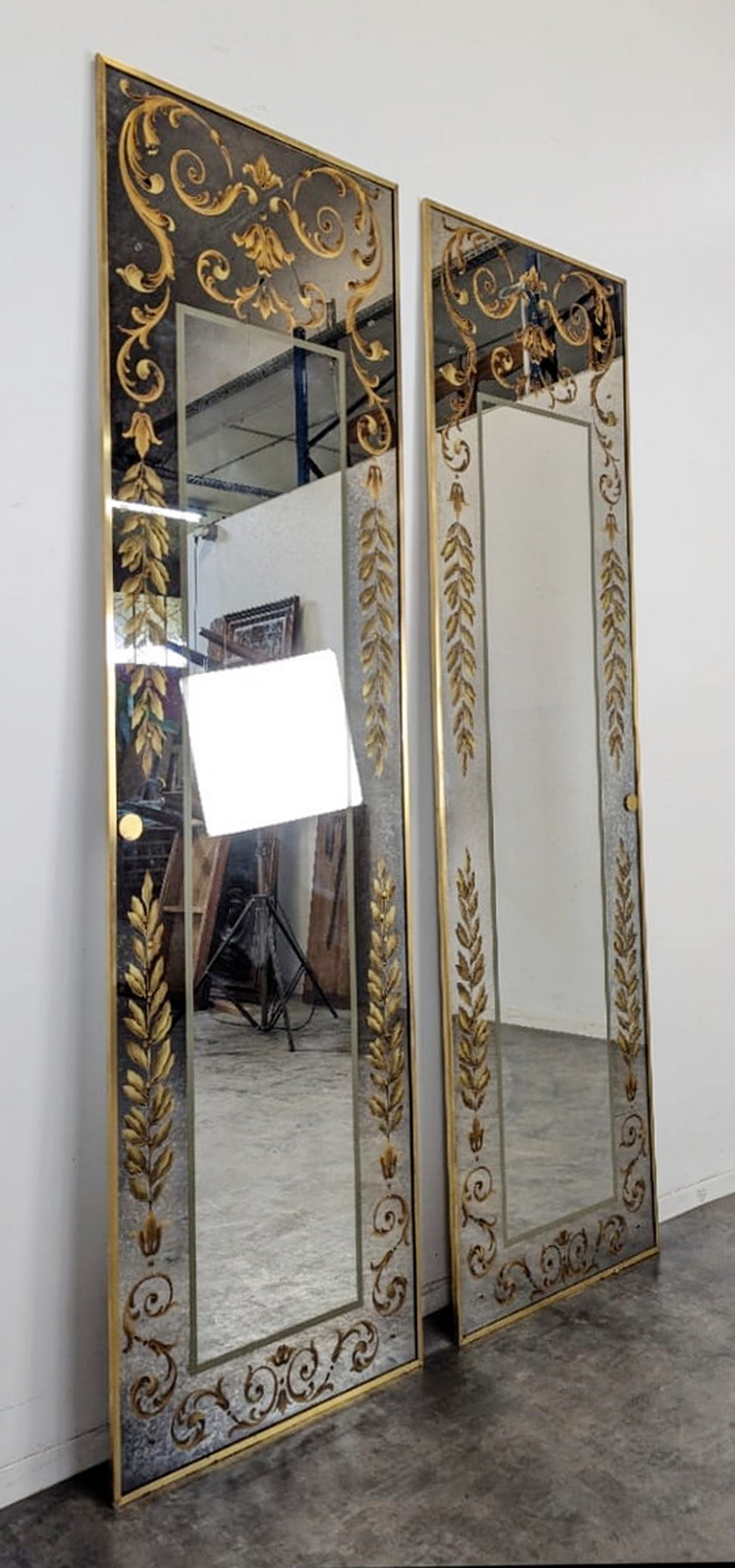 A pair of French Eglomise Mirrors 
